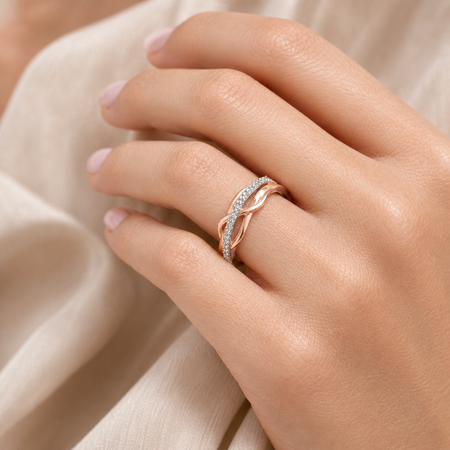 Simply Savvy “Intertwined Radiance” – 10K Two-Tone Gold Diamond Ring (1/10 CTW)