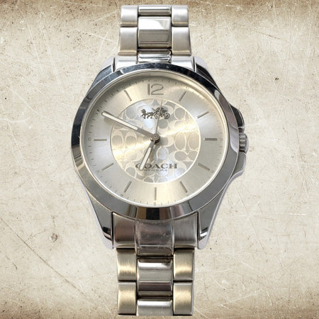 Coach Silver Signature Bangle Watch – Minimalist Bracelet Style (Pre-Owned)