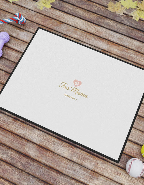 Load image into Gallery viewer, Fur Mama pet mat, 18x24 non-slip feeding mat for dogs and cats

Pet feeding mat with Fur Mama design placed under food bowls

Non-slip entry mat for dog and cat lovers with Fur Mama text

Soft, durable pet mat for feeding stations and entryways

Fur Mama-themed pet mat displayed with dog bowl and water bowl

Absorbent non-slip pet mat for dog and cat home décor
