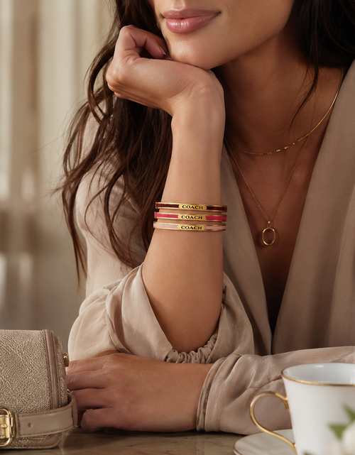 Load image into Gallery viewer, Coach Gold Tone Enamel Bangle Bracelet Set Red Brown Pink Stack
