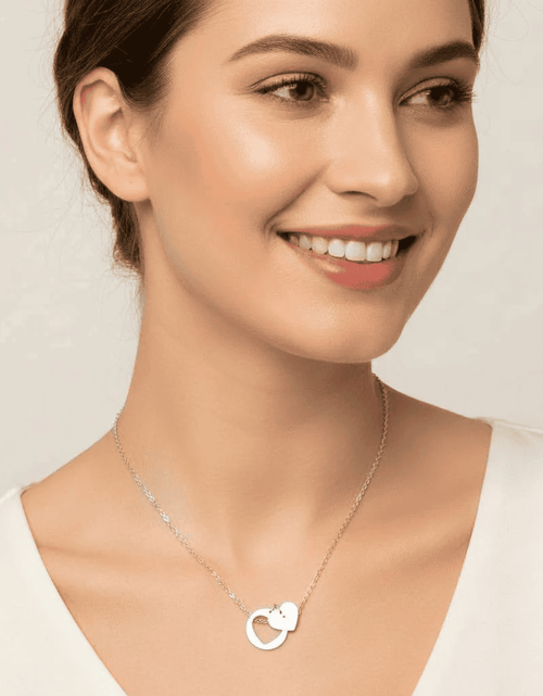 Load image into Gallery viewer, Heart cutout necklace with engravable sterling heart pendant for personalized gift

Sterling silver heart pendant necklace with cutout design for engraving

Engravable heart cutout necklace in sterling silver for custom jewelry

Personalized sterling silver heart pendant with cutout design necklace
