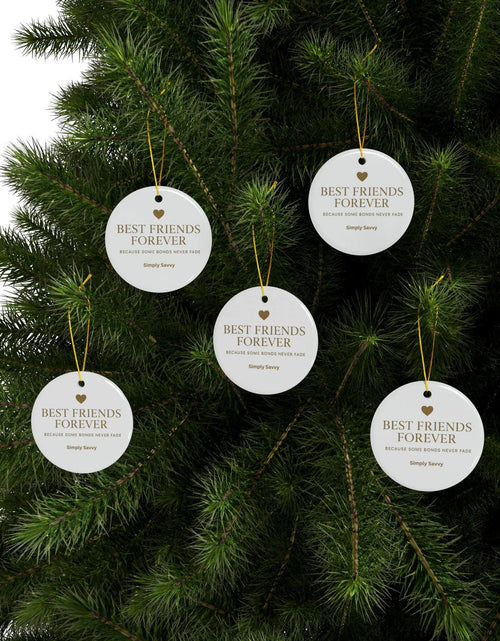 Load image into Gallery viewer, Best Friends Forever ceramic ornament with ‘Because Some Bonds Never Fade’ inscription

BFF keepsake ceramic ornament for friendship with meaningful quote

Friendship ceramic ornament with Best Friends Forever gold lettering and quote

Decorative BFF ceramic ornament with ‘Because Some Bonds Never Fade’ text
