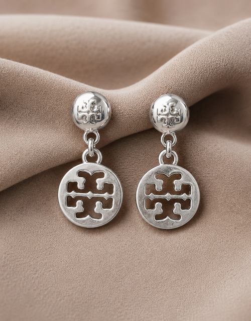 Load image into Gallery viewer, Pre-Owned Tory Burch Silver Tone Logo Medallion Drop Earrings
