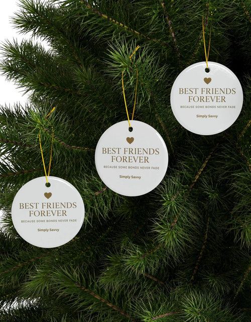Load image into Gallery viewer, Best Friends Forever ceramic ornament with ‘Because Some Bonds Never Fade’ inscription

BFF keepsake ceramic ornament for friendship with meaningful quote

Friendship ceramic ornament with Best Friends Forever gold lettering and quote

Decorative BFF ceramic ornament with ‘Because Some Bonds Never Fade’ text

