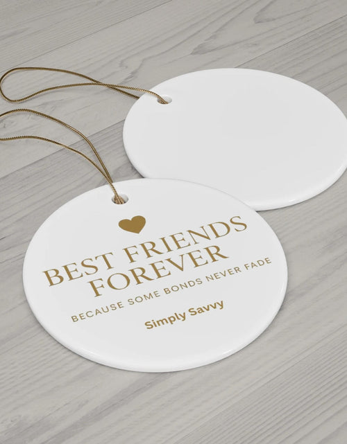 Load image into Gallery viewer, Best Friends Forever ceramic ornament with ‘Because Some Bonds Never Fade’ inscription

BFF friendship keepsake ceramic ornament with meaningful quote for gift

Ceramic ornament for best friends with sentimental message and BFF design

Decorative Best Friends Forever ornament with ‘Because Some Bonds Never Fade’ text
