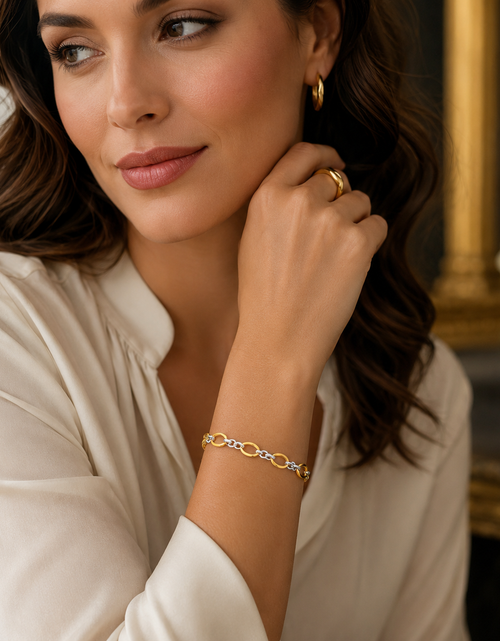 Load image into Gallery viewer, 14K Two Tone Gold Twisted Oval Link Bracelet, 7.75"
