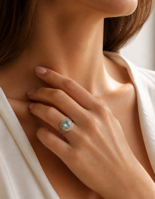 Load image into Gallery viewer, Azure Halo Radiance Ring-Pangea Mines Sky Blue Topaz Halo Ring – Sterling Silver Size 9
