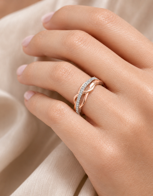 Load image into Gallery viewer, Simply Savvy “Intertwined Radiance” – 10K Two-Tone Gold Diamond Ring (1/10 CTW)
