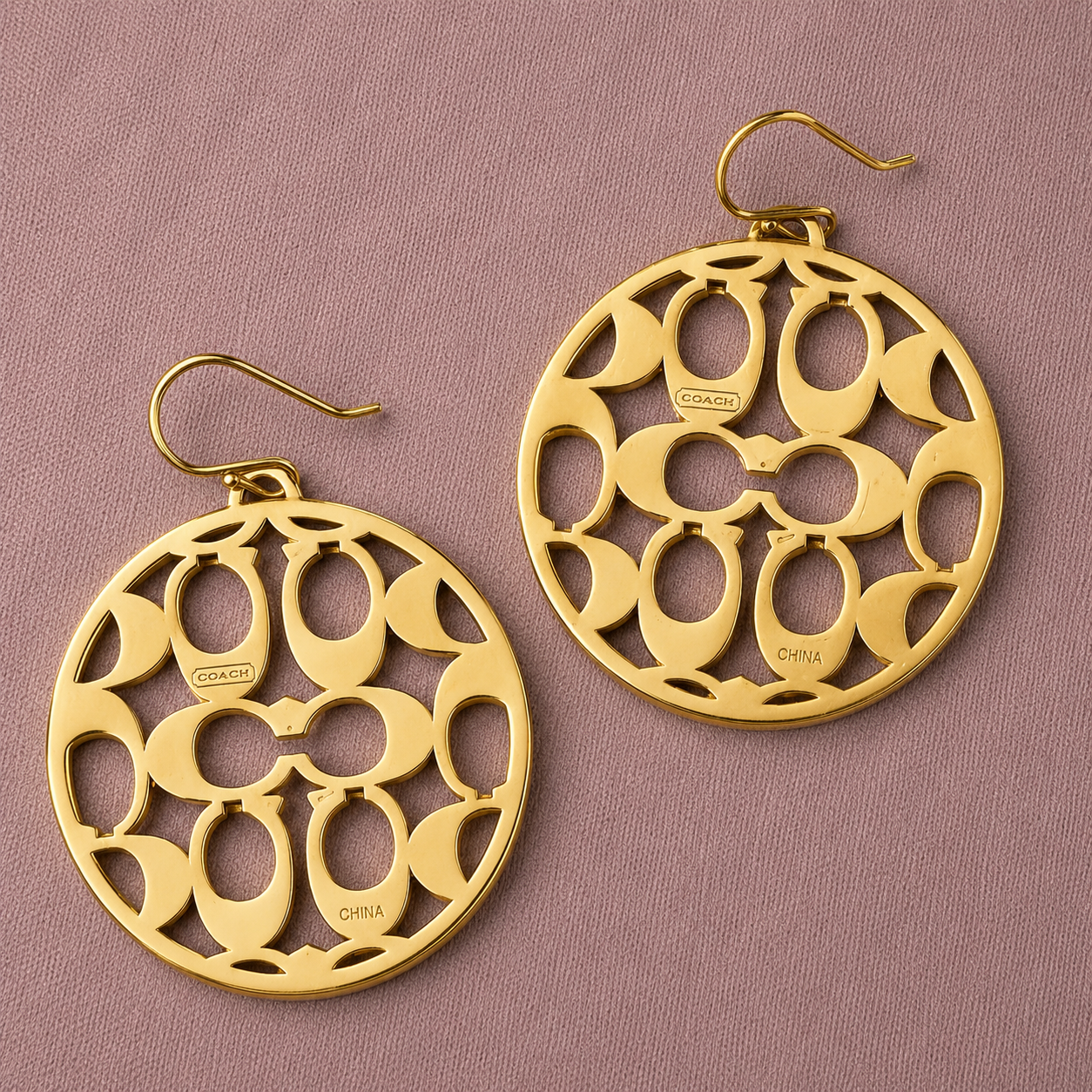 Coach Gold Tone Signature Openwork Disc Dangle Earrings