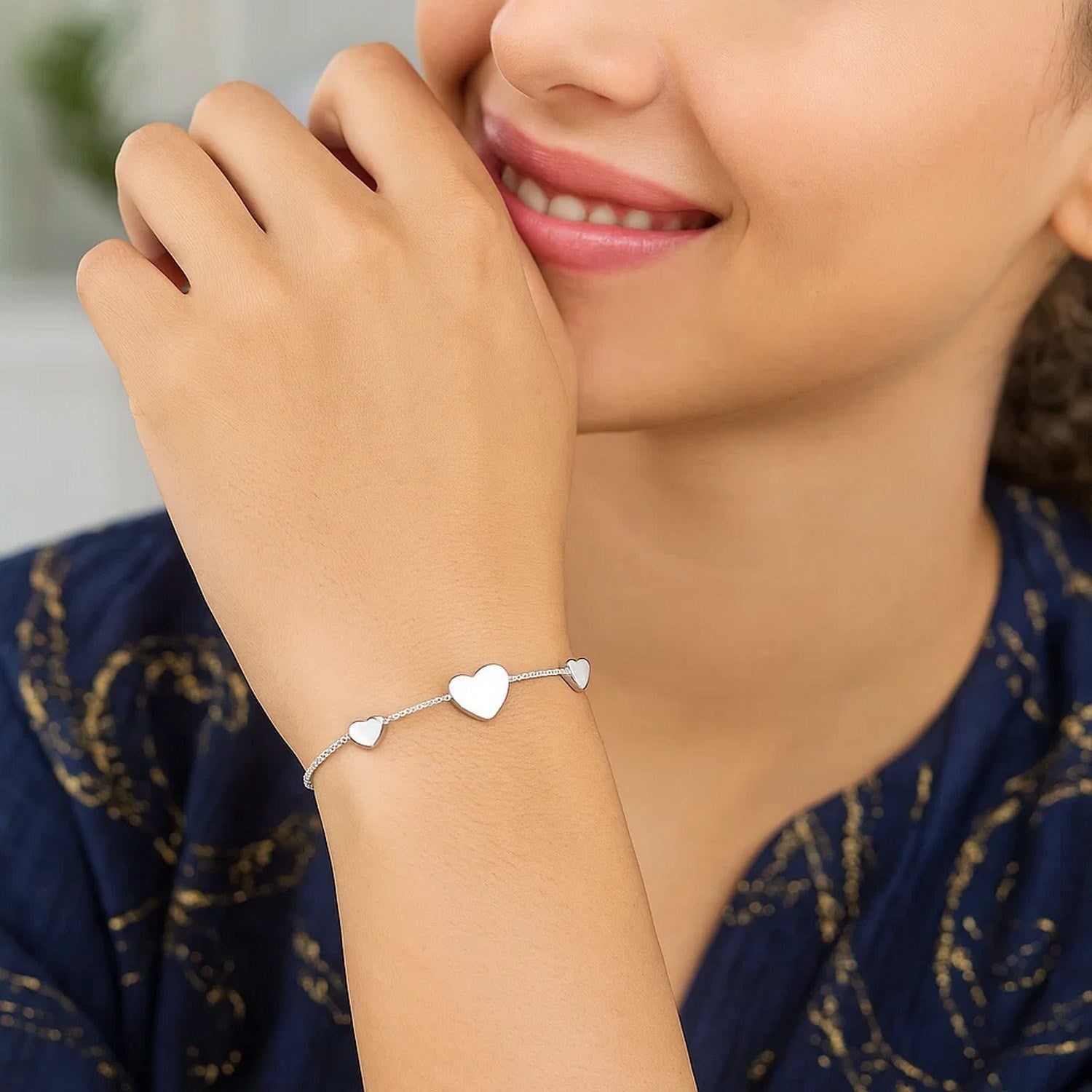 Sterling Silver Hearts Station Bracelet