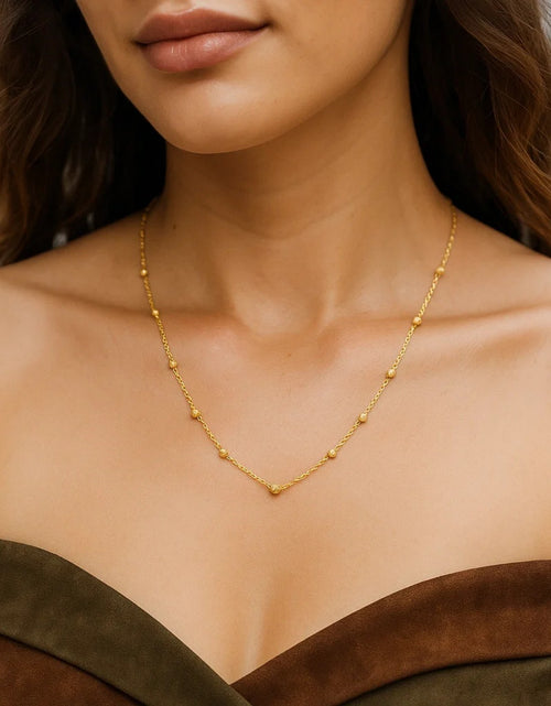 Load image into Gallery viewer, 14K Yellow Gold Textured Saturn Bead Station Necklace – 18 Inch

