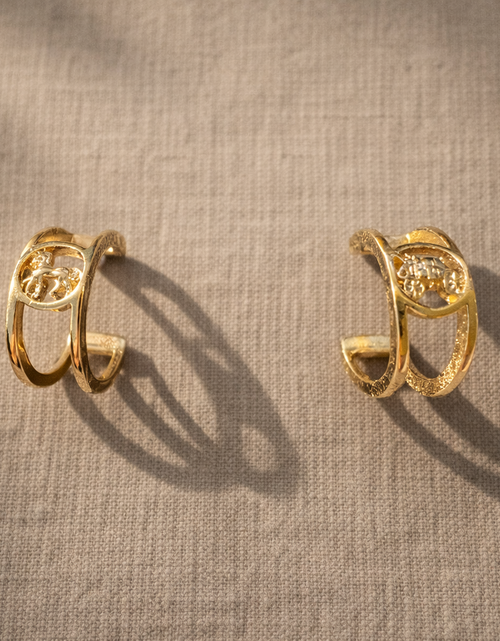 Load image into Gallery viewer, Coach Gold Logo Huggie Earrings – Signature C Design
