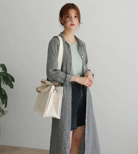 Spacious canvas tote bag with removable bottom compartment