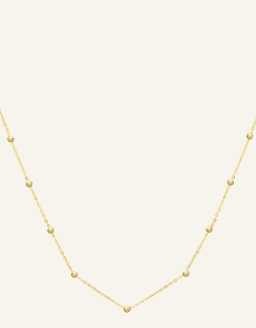 Load image into Gallery viewer, 14K Yellow Gold Textured Saturn Bead Station Necklace – 18 Inch
